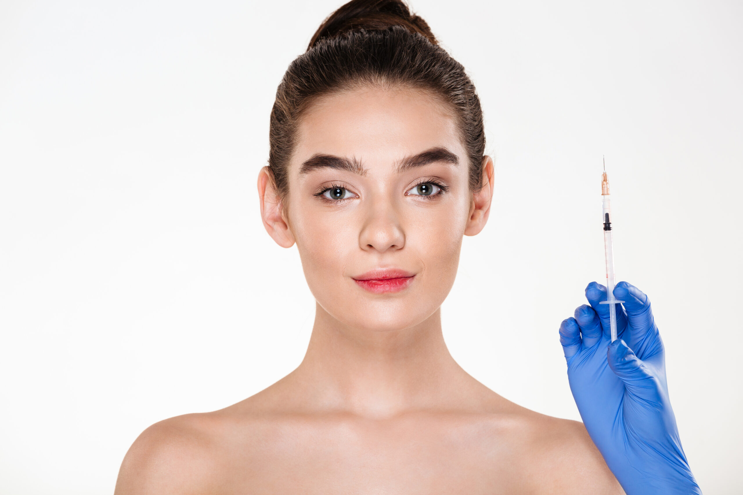 Image of pretty woman preparing for beauty injection made by doc