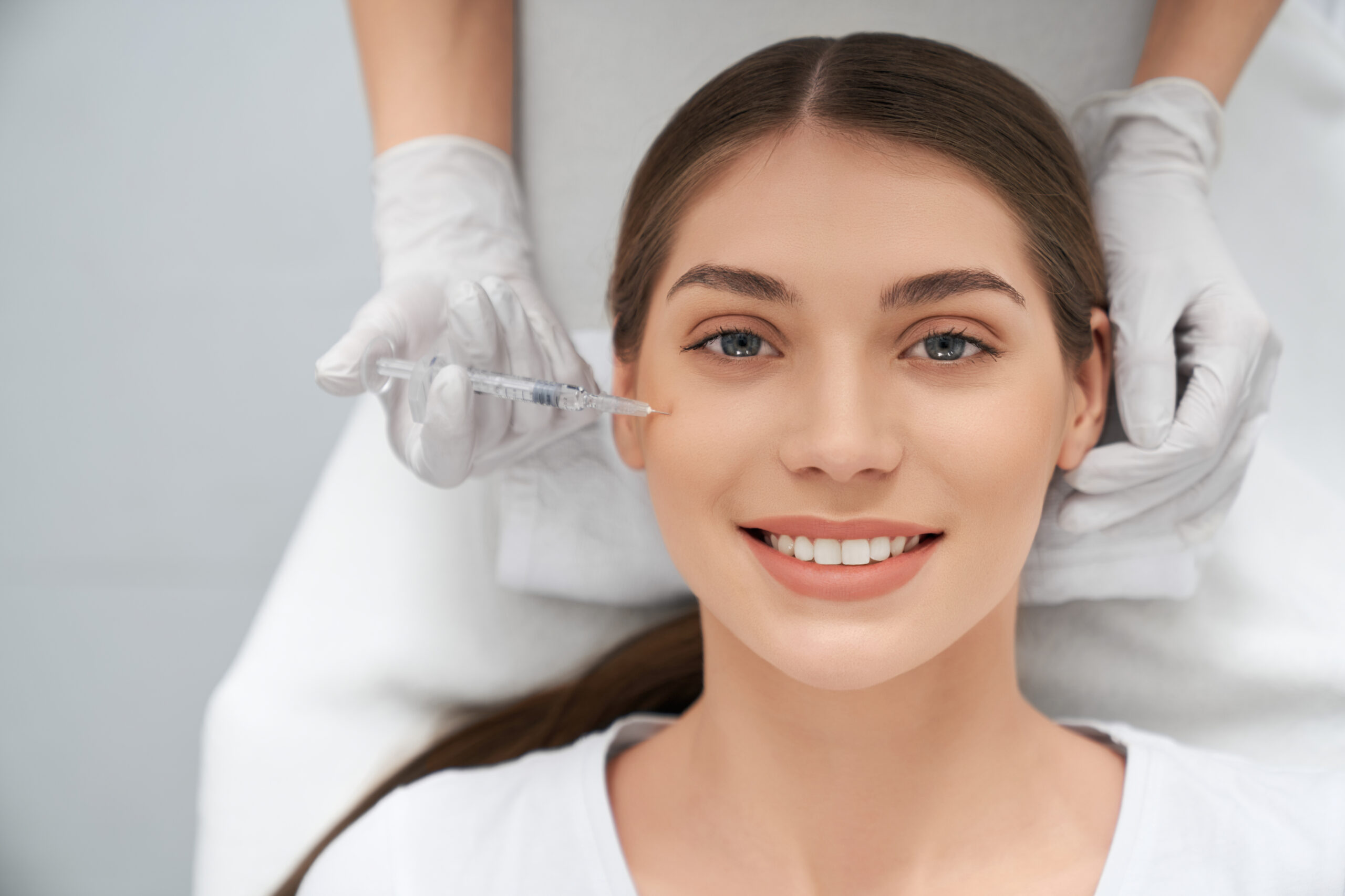 Woman in doing procedure for improvements face skin.